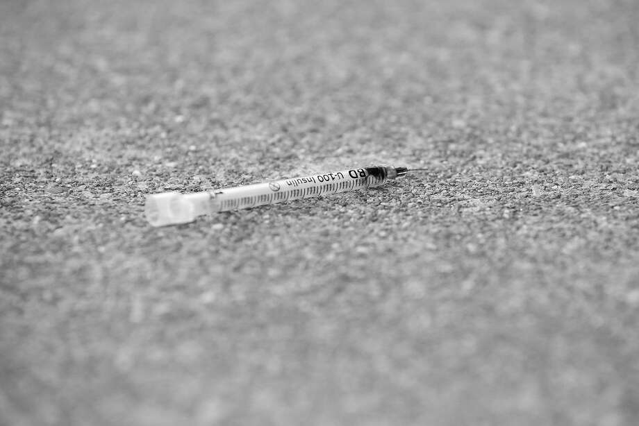 A used syringe lays on the sidewalk on Isis Street on Monday, April 23, 2018 in San Francisco, Calif. Photo: Lea Suzuki / The Chronicle
