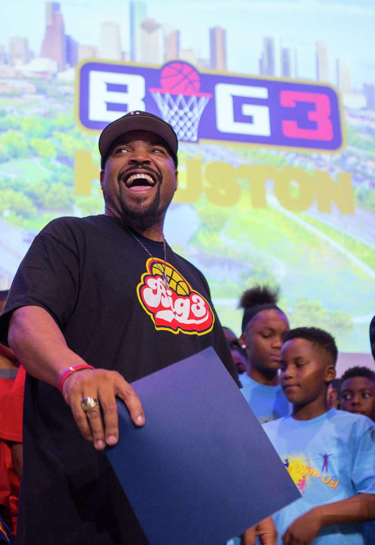 Photos from Ice Cube's visit to Houston as part of youth basketball