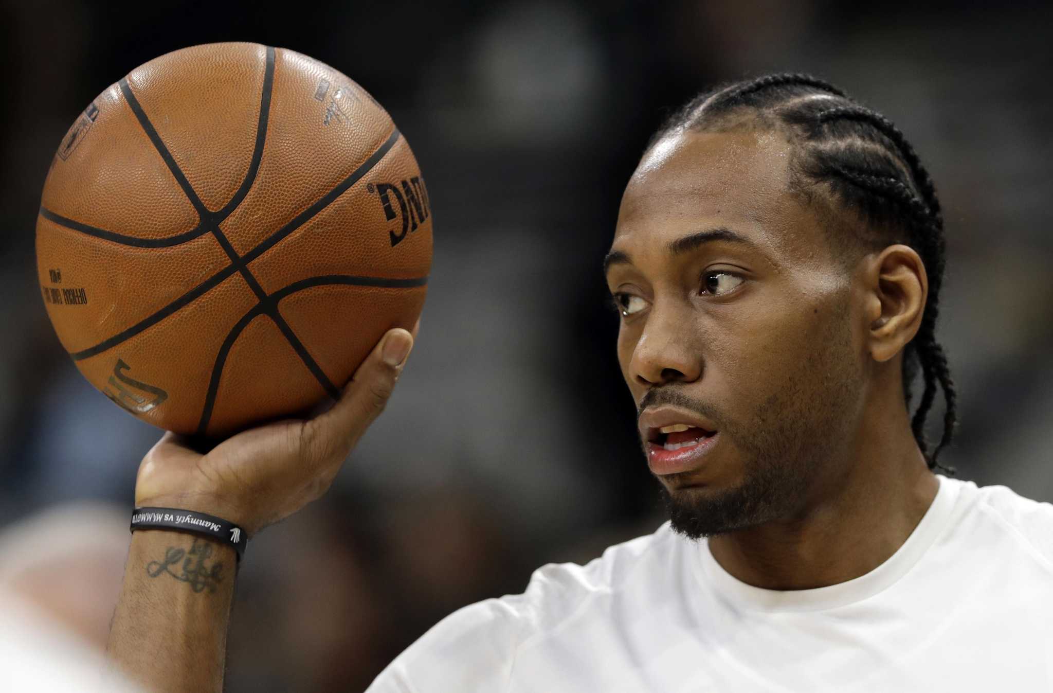 who was kawhi leonard traded for on draft night