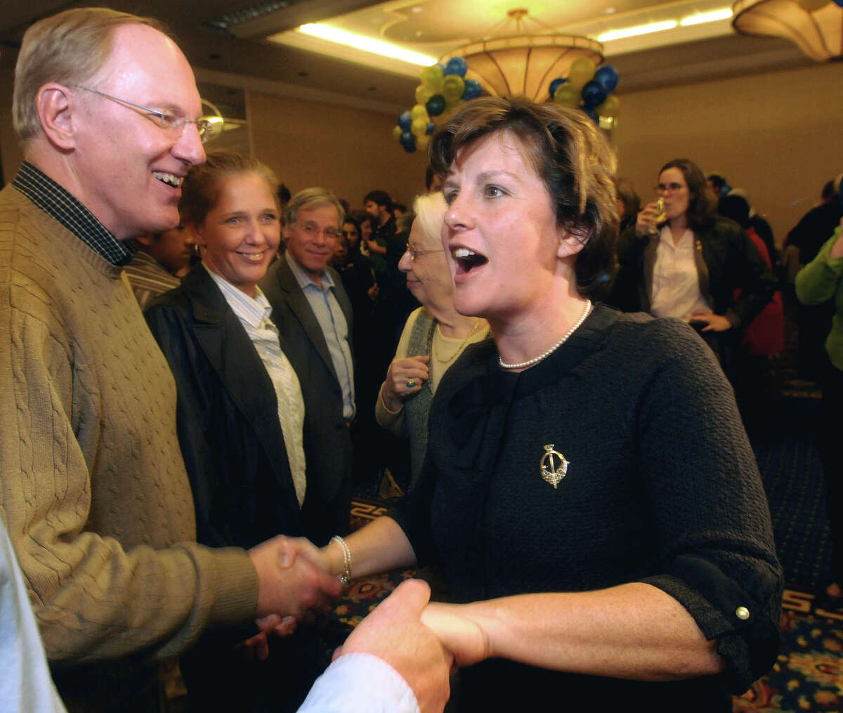 In this Nov. 3, 2009 file photo, Syracuse Mayor elect Stephanie Miner greets Jim Jackson after her victory speech at the University Sheraton Regency Ballroom in Syracuse, N.Y. Miner, the Democratic incumbent, faces challenges in the primary, Tuesday, Sept. 10, 2013 from City Councilor Pat Hogan and Alfonso Davis, an insurance agent. (AP Photo/The Post Standard, /Mike Greenlar, File) ORG XMIT: NYSYR105