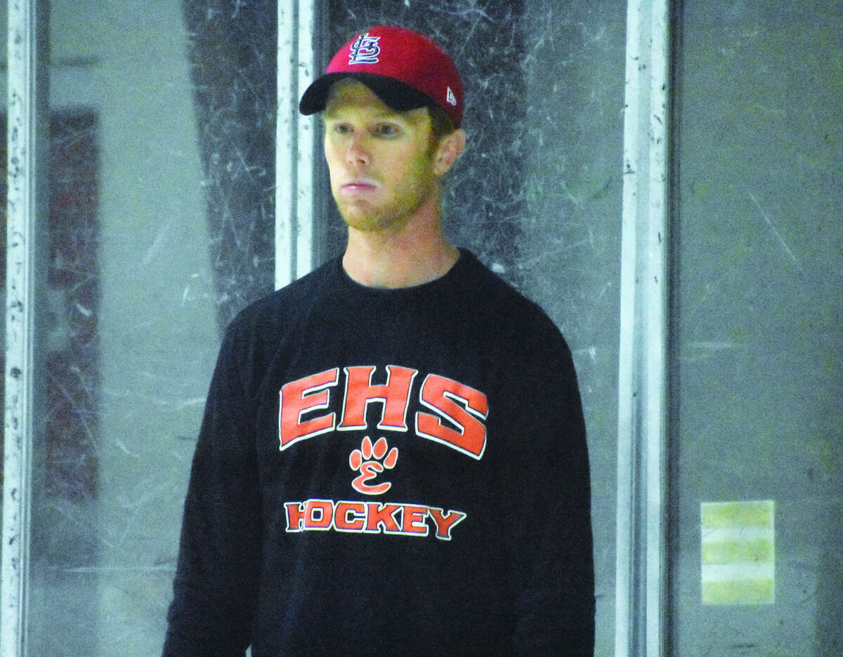 Edwardsville ice hockey coach Jason Walker directs practice on Wednesday inside the East Alton Ice Arena.