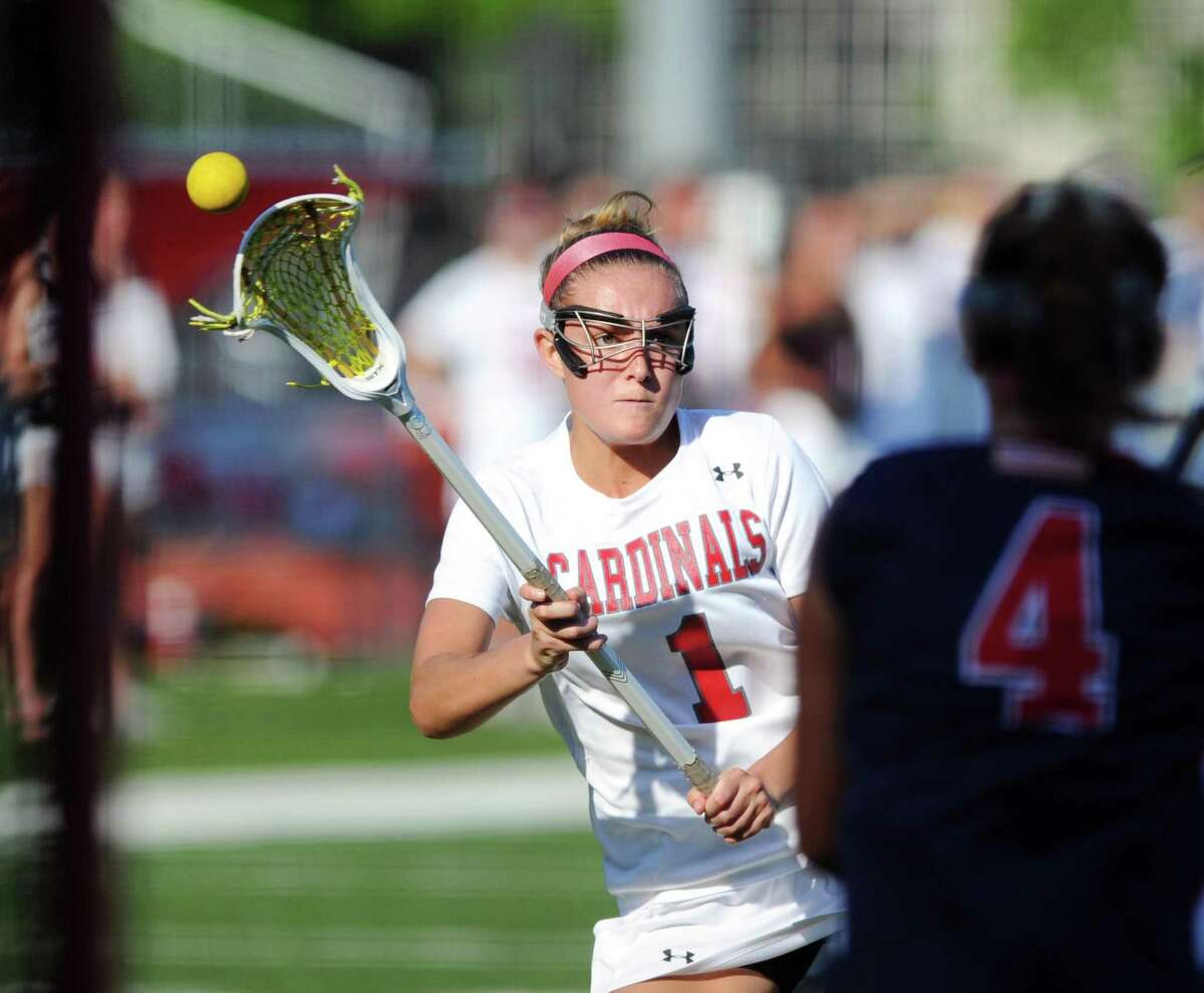 Greenwich’s Maggie O’Gorman scores against McMahon in a Class L playoff contest on May 29.