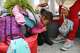 TIJUANA, MEXICO - JUNE 21: A migrant mother waits with one of her two daughters on their way to the port of entry to ask for asylum in the U.S. on June 21, 2018 in Tijuana, Mexico. The mother, who did not wish to give their names, said they were fleeing their hometown near the Pacific coast of Mexico after suffering a violent carjacking of her taxicab. The Trump Administration's controversial zero tolerance immigration policy led to an increase in the number of migrant children who have been separated from their families at the southern U.S. border. U.S. Attorney General Jeff Sessions has added that domestic and gang violence in immigrants' country of origin would no longer qualify them for political asylum status. (Photo by Mario Tama/Getty Images)