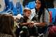 MCALLEN, TX - JUNE 21: A woman who idendtified herself as Jennifer sits with her son Jaydan at the Catholic Charities Humanitarian Respite Center after recently crossing the U.S., Mexico border on June 21, 2018 in McAllen, Texas. Once families and individuals are released from Customs and Border Protection to continue their legal process, they are brought to the center to rest, clean up, enjoy a meal and get guidance to their next destination. Before Trump signed an executive order yesterday that the administration says halts the practice of separating families seeking asylum, more than 2,300 immigrant children had been separated from their parents in the zero-tolerance policy for border crossers. (Photo by Spencer Platt/Getty Images)