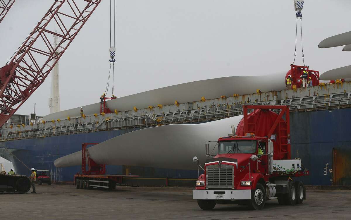 Giant wind turbine blades are offloaded from a freighter Friday January 20, 2017 at the Port of Corpus Christi. Parts for wind turbines that are being erected in the United States come from countries across the globe such as Spain and Brazil. These blades are 63 meters long and are made of carbon fiber. The Port of Corpus Christi started receiving wind energy cargo in 2006.