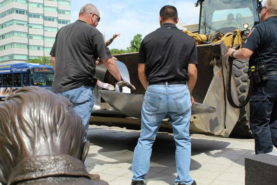 Protesters place giant heroin spoon outside Stamford’s Purdue Pharma Connecticut Post