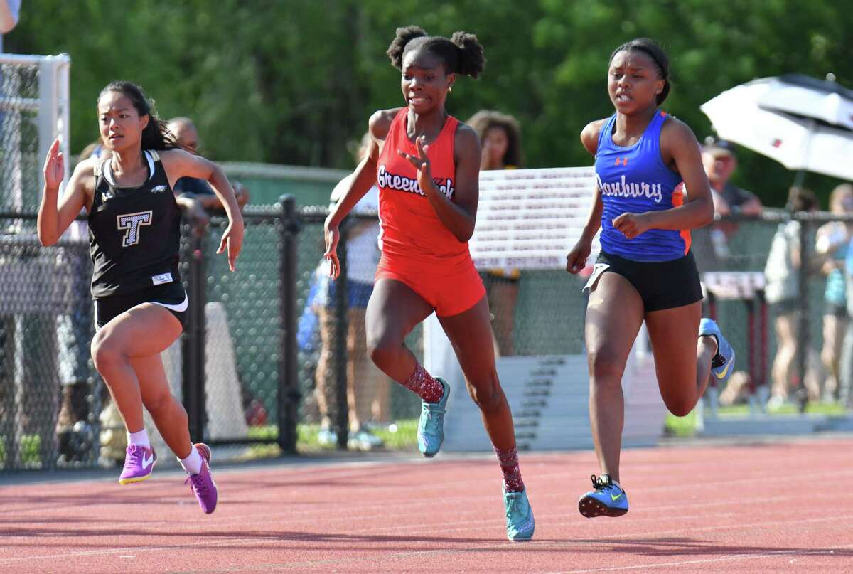 Greenwich’s Jada Williams competes in the 100 meter dash during the Class LL state championship on May 30.
