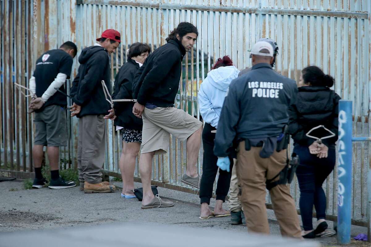 Authorities arrested 21 suspected members of the violent gang MS-13 in Los Angeles County early Wednesday morning, May 17, 2017. (Irfan Khan/Los Angeles Times/TNS)