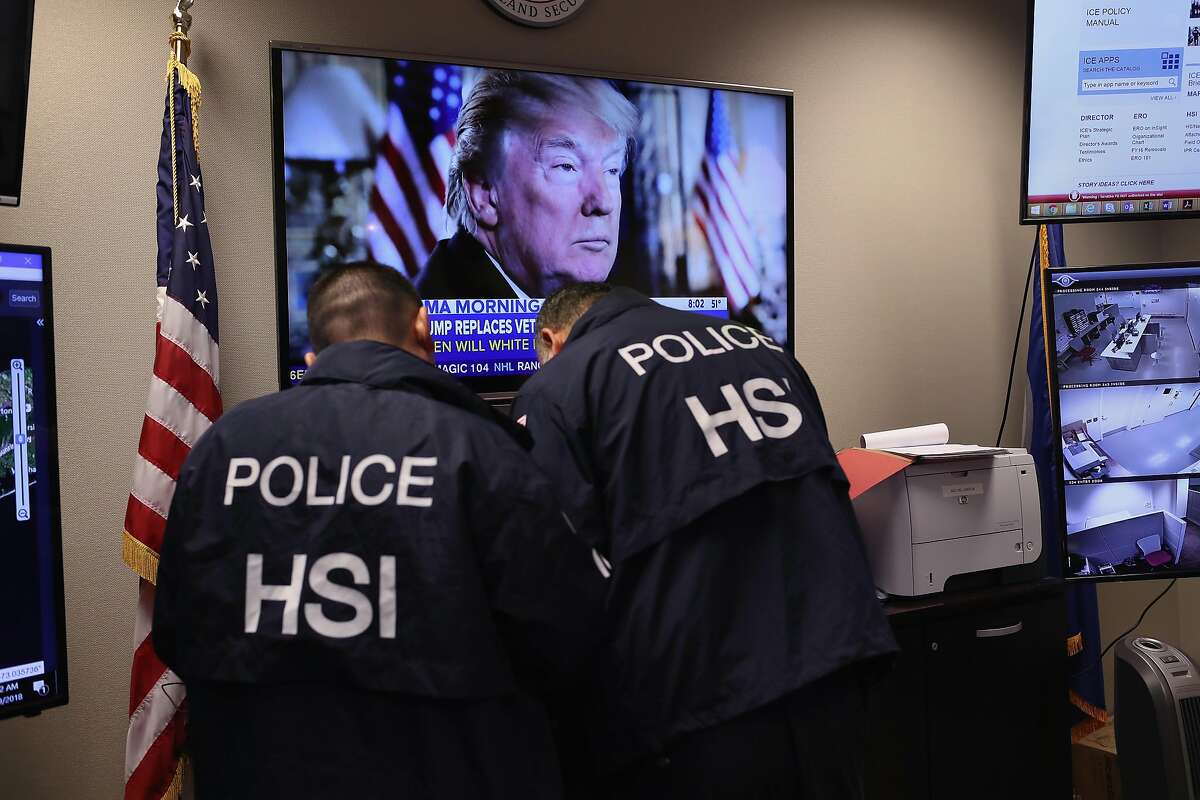 CENTRAL ISLIP, NY - MARCH 29: Homeland Security Investigations (HSI) ICE agents work in a control center during an operation targeting immigrant gangs in Central Islip, New York. Overnight and into the morning, U.S. federal agents and local police detained suspected gang members across Long Island in a surge of arrests. The actions were part of Operation Matador, a nearly year-long anti-gang effort targeting transnational gangs, with an emphasis on MS-13. (Photo by John Moore/Getty Images)