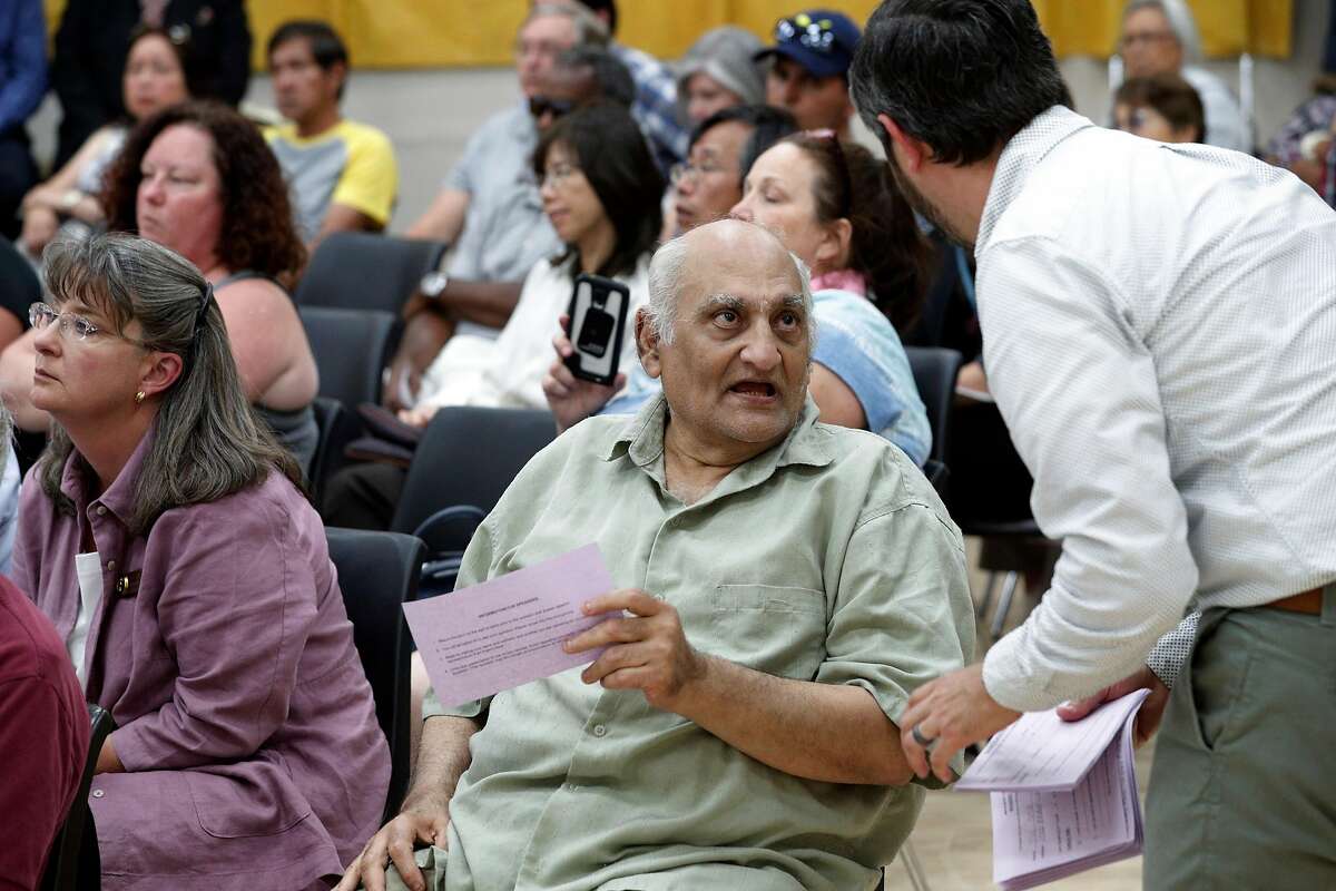Behram Leskari of Pittsburg asks for a public comment slip during a community forum hosted by the Contra Costa Environmental Health and County Supervisor Federal Glover at Ambrose Community Center in Bay Point, Calif., on Thursday, June 21, 2018. The forum was held to answer questions about the alleged disposal of potentially radioactive materials from the Hunters Point Naval Shipyard at Keller Canyon Landfill in Bay Point.