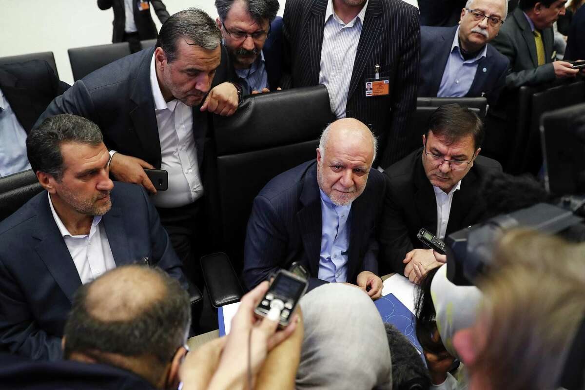 Bijan Namdar Zanganeh, Iran's petroleum minister, center, speaks to reporters ahead of the 174th Organization Of Petroleum Exporting Countries (OPEC) meeting in Vienna, Austria, in June. >>Trump's tweets on oil, Iran, China and more