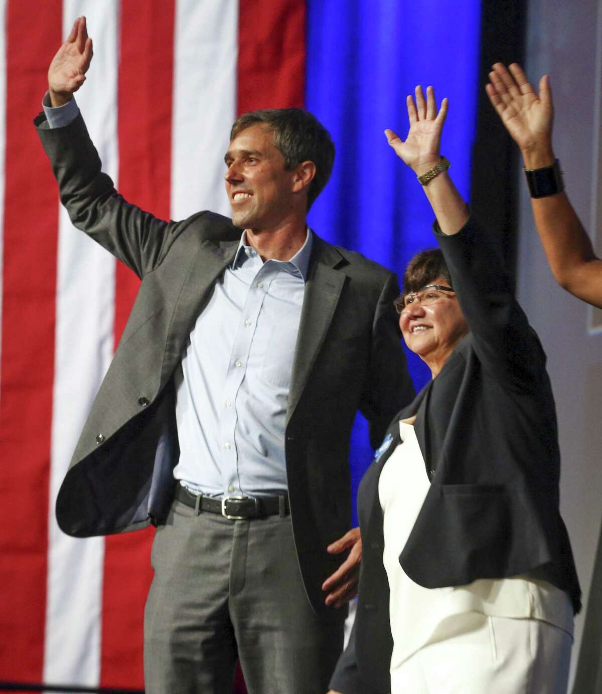 Beto O'Rourke and Lupe Valdez wave to the crowd at the end of the general session at the Texas Democratic Convention Friday, June 22, 2018, in Fort Worth, Texas. (AP Photo/Richard W. Rodriguez)