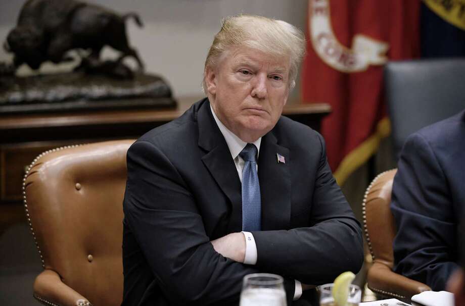 US President Donald Trump attends a working lunch with governors in the Roosevelt Room of the White House, in Washington, DC, June 21, 2018.  / AFP PHOTO / Olivier DoulieryOLIVIER DOULIERY/AFP/Getty Images Photo: OLIVIER DOULIERY / AFP or licensors