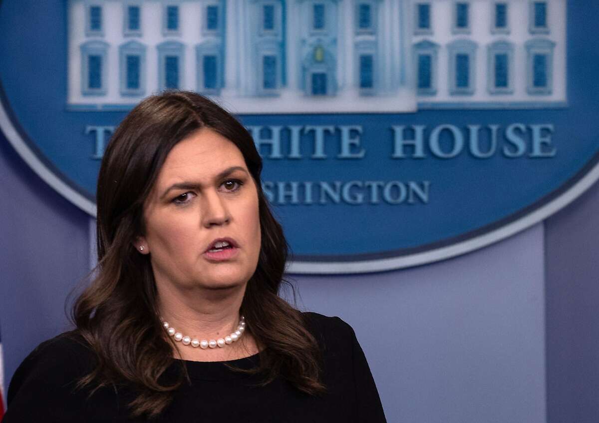 (FILES) In this file photo taken on June 14, 2018, White House spokesperson Sarah Huckabee Sanders arrives at the press briefing at the White House in Washington, DC. A Virginia restaurant was inundated with reviews from both ends of the political spectrum Saturday, June 23, 2018, after White House press secretary Sarah Sanders said its owner asked her to leave because of her job. On Friday, June 22, 2018, a Facebook user claiming to be a waiter at The Red Hen in Lexington, Virginia -- around 70 miles southwest of Charlottesville -- said he served Sanders "for a total of 2 minutes" before she and her party were asked to leave. His post went viral when Brennan Gilmore, a musician, activist and former US diplomat, uploaded a screenshot to Twitter alongside an image of a handwritten note which read "86 - Sara Huckabee Sanders," supposedly from the restaurant. To "86" someone is a slang term meaning to refuse to serve a customer. "Last night I was told by the owner of Red Hen in Lexington, VA to leave because I work for @POTUS and I politely left," Sanders tweeted on Saturday, confirming the incident. / AFP PHOTO / NICHOLAS KAMMNICHOLAS KAMM/AFP/Getty Images