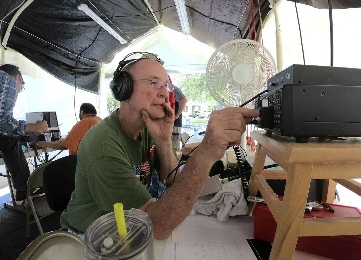 Lloyd Swartz tunes his radio during the national Amateur Radio Field Day exercise by members of the San Antonio Radio Club at Shavano Park City Hall on Saturday, June 23, 2018. The public event was designed to educate the public about ham radios and their reliability during natural disasters.