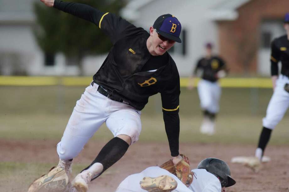 Luke Gold of Ballston Spa High School tags out Jack O'Leary of Christian Brothers Academy in between first and second during the Christian Brothers Academy and Ballston Spa High School baseball game on Thursday, April 5, 2018, in Albany, N.Y.    (Paul Buckowski/Times Union) Photo: PAUL BUCKOWSKI / (Paul Buckowski/Times Union)