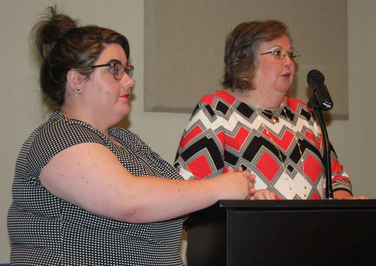 Austin Memorial Library Director Mary Cohn (right) and Youth Services Coordinator Wendy Thorp (left) during the June 19 Cleveland City Council meeting discuss the item regarding the library partnering with the Houston Food Bank for its Feeding America Summer Nutrition Program.
