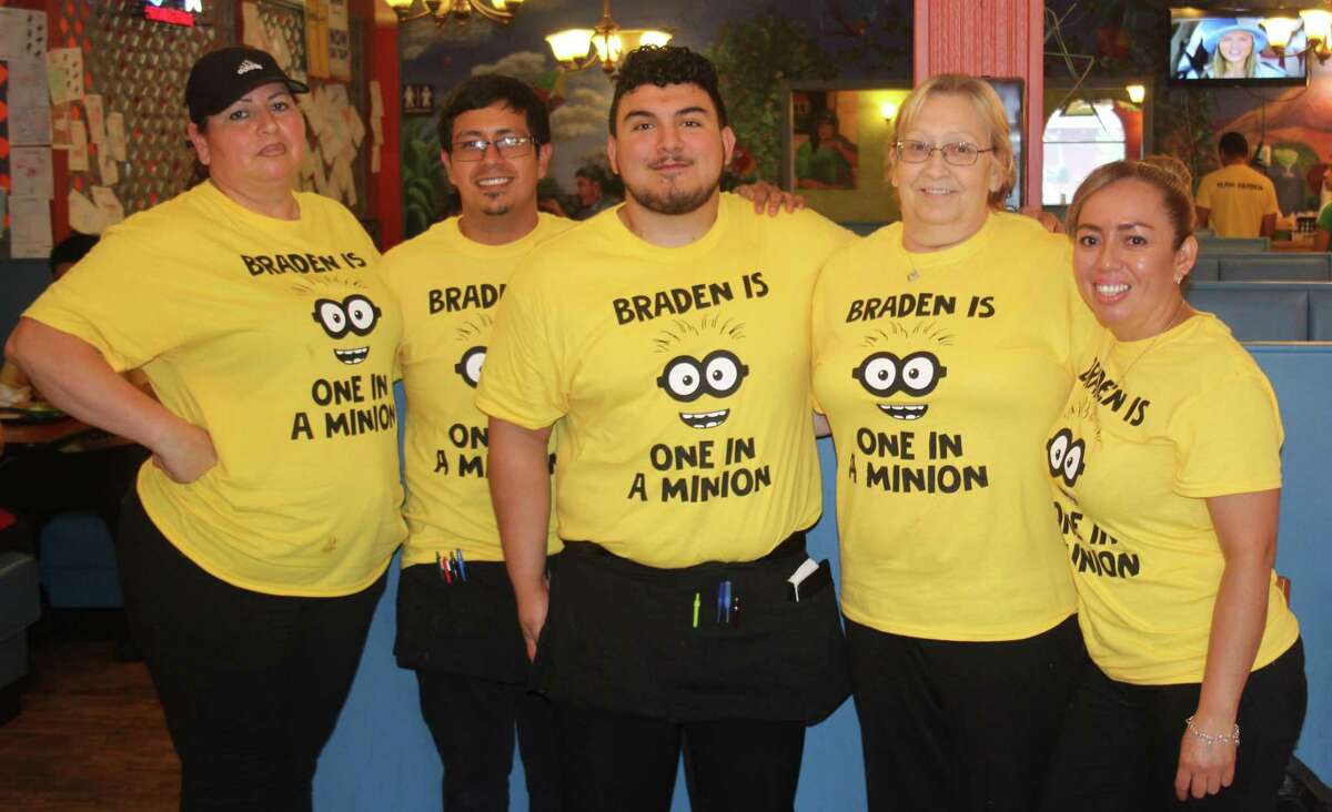 Staff at El Burrito wear yellow shirts stating “Braden is one in a minion” on June 23. The staff members are supporting Braden West, who has just recently undergone his 75th surgery. Pictured left to right are Dinora Guadiana, Adrian Sanchez, Isidro Galvan, Kathy Booker and Julie Sanchez.