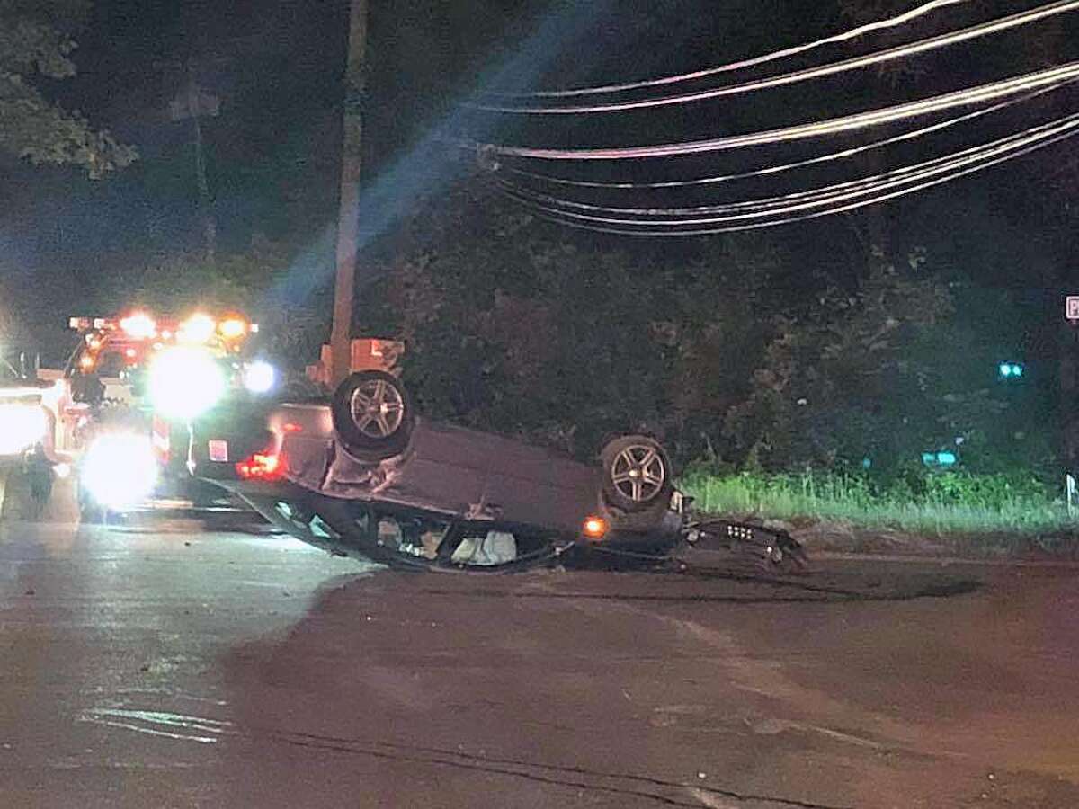 Oxford FD Car rollover crash ripped wires from house, caused fire