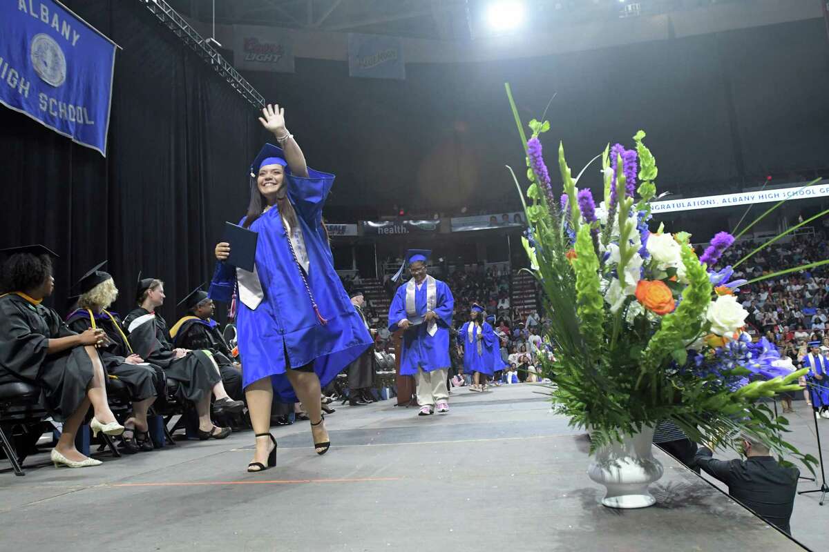 Albany High School graduates walk across the stage to receive their diplomas during their graduation at the Times Union Center on Sunday, June 24, 2018, in Albany, N.Y. (Paul Buckowski/Times Union)