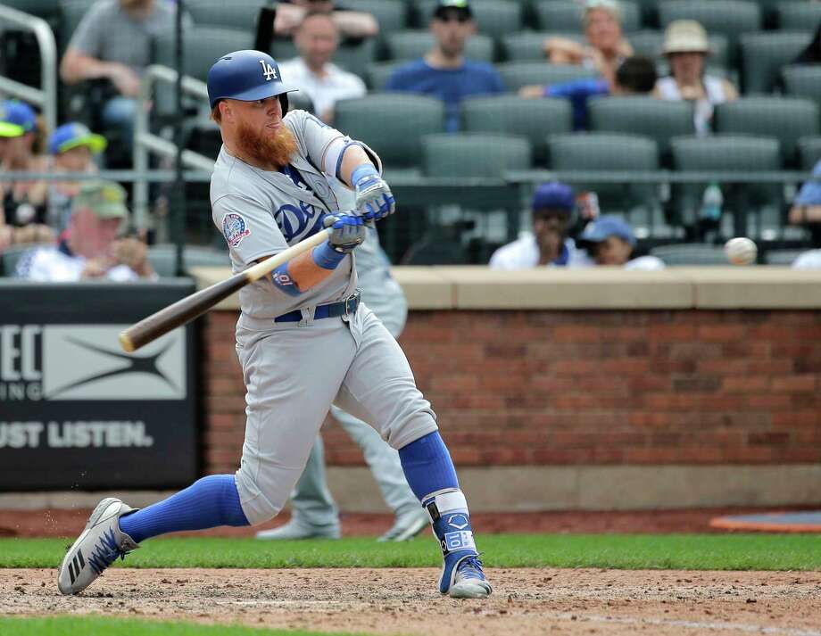 Los Angeles Dodgers' Justin Turner hits a solo home run during the 11th inning of a baseball game against the New York Mets at Citi Field, Sunday, June 24, 2018, in New York. (AP Photo/Seth Wenig) Photo: Seth Wenig / AP