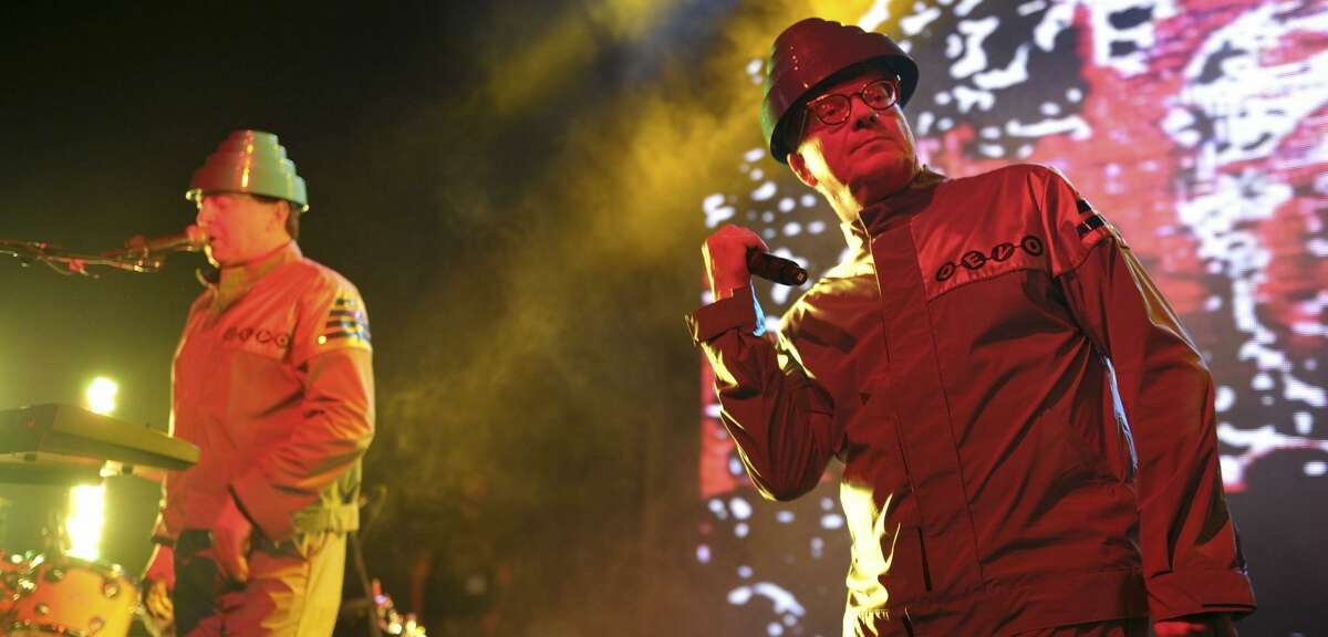 Gerald Casale (left) and Mark Mothersbaugh of Devo perform in Los Angeles in 2011. The group headlines Burger Boogaloo this weekend.