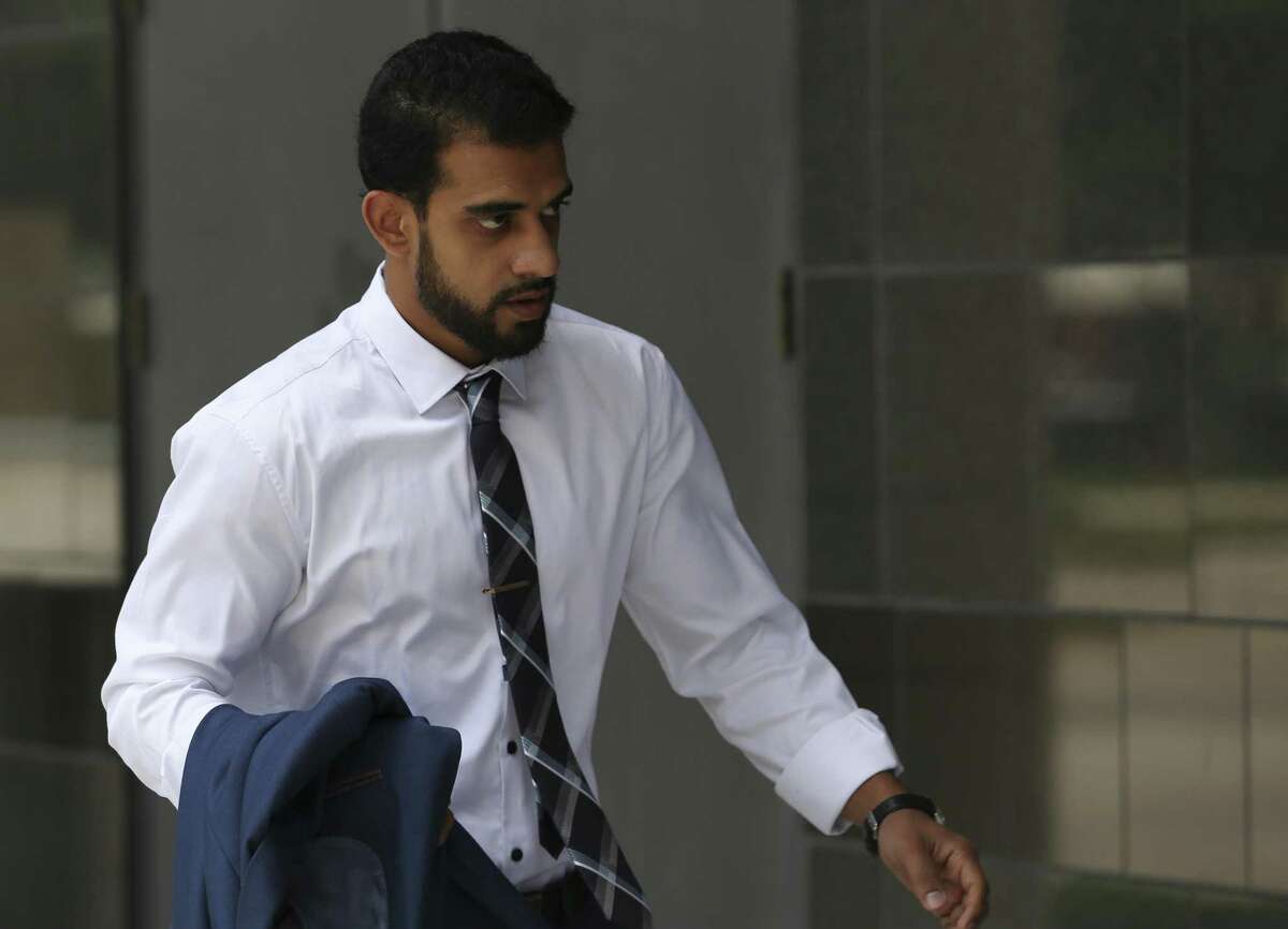 Asher Abid Khan, 23, of Spring, walks toward the United States District Courthouse for his sentencing before a federal court judge on Monday, June 25, 2018, in Houston. Khan was a University of Houston student who admitted he plotted to join the jihadist fight in Syria. ( Yi-Chin Lee / Houston Chronicle )