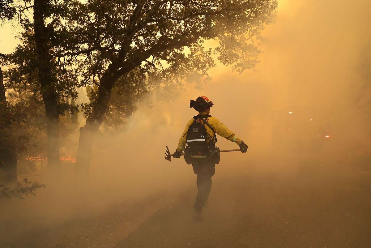 Cal Fire battles the Pawnee Fire along Spring Valley Road in Lake County, Calif. on Sunday, June 24, 2018.