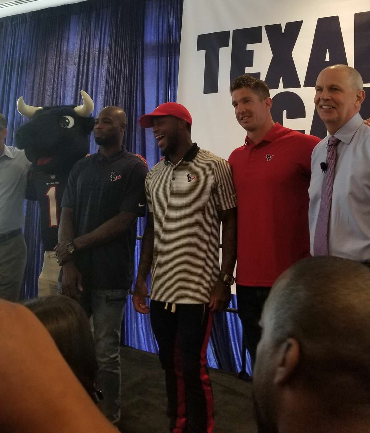 Houston Texans' Johnathan Joseph, Kareem Jackson, Brian Peters and team president Jamey Rootes attended an event announcing the team's partnership with Chevron on Monday.