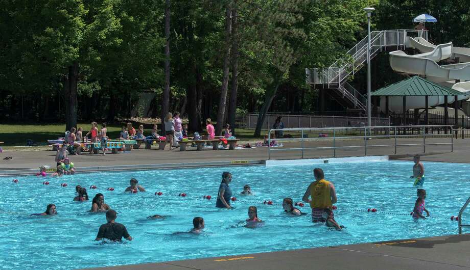 Kids and their chaperones enjoy the newly renovated Peerless Pools on the grounds of the Saratoga State Park June 25, 2018 in Saratoga Springs, N.Y. (Skip Dickstein/Times Union) Photo: SKIP DICKSTEIN / 29944187A