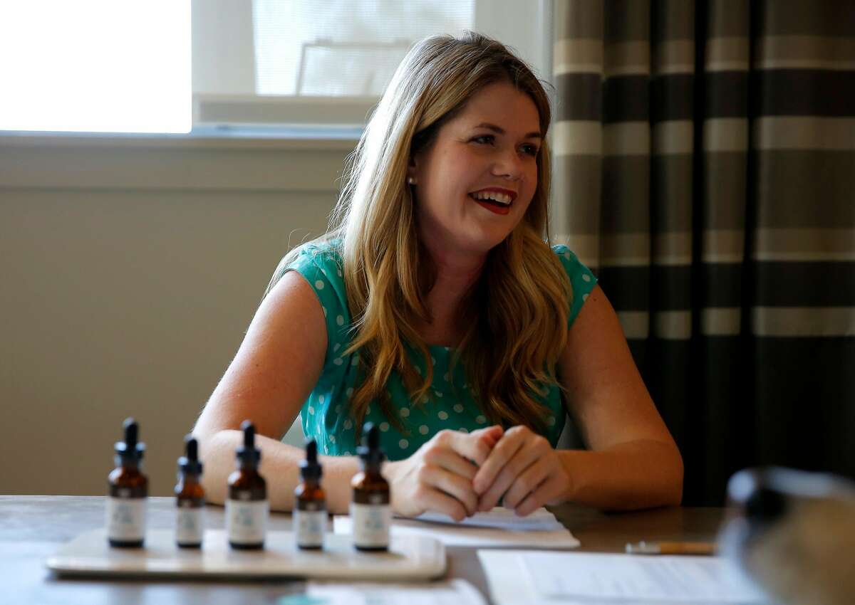Alison Ettel, CEO and founder of TreatWell, laughs during a consultation at her apartment complex in San Francisco, California, on Sunday, Oct. 18, 2015.