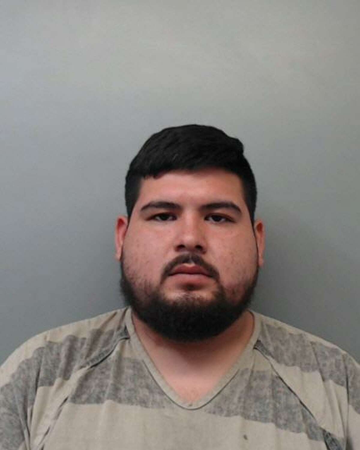 Alberto Alvarez, 21, was charged with aggravated robbery with a firearm, deadly conduct and discharge of a firearm.
