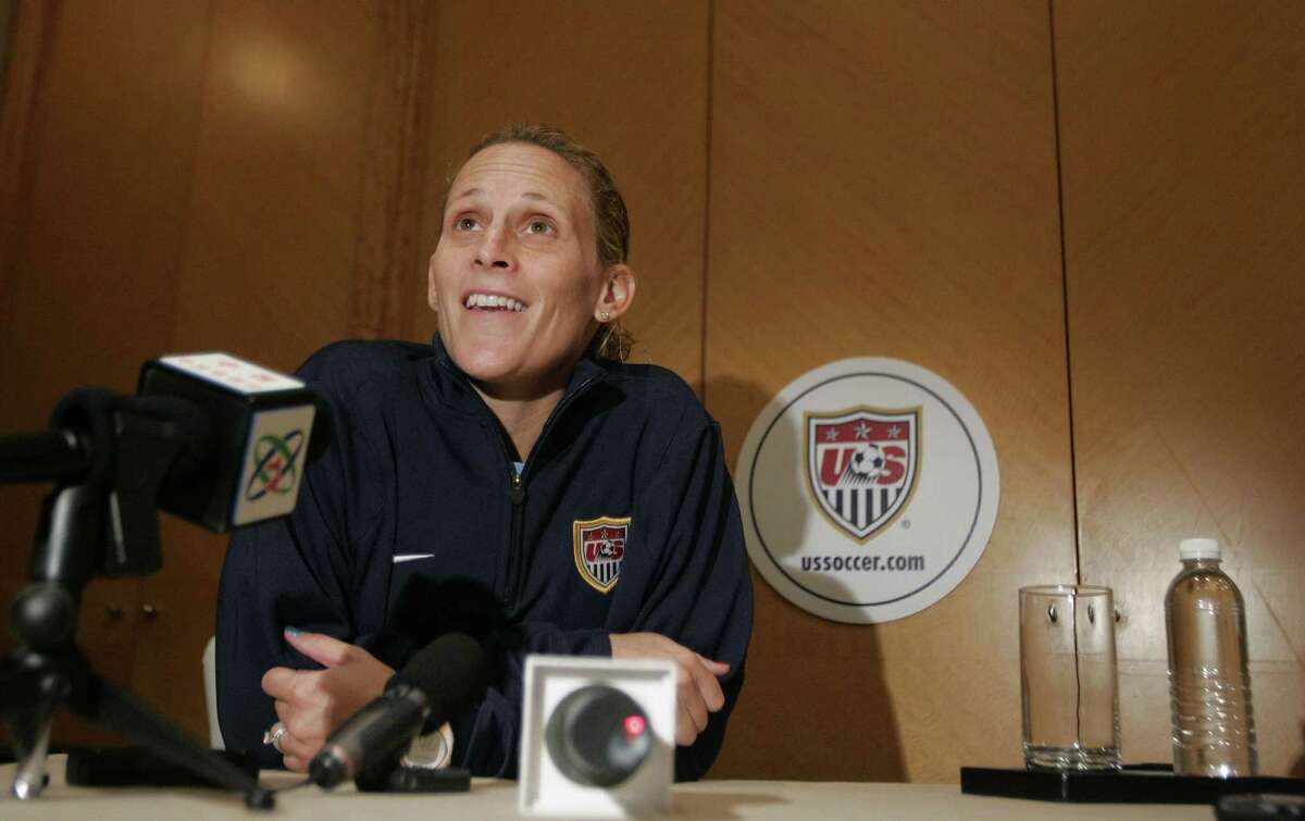 United States soccer team captain Kristine Lilly answers questions at a press conference Monday, Sept. 17, 2007 in Shanghai, China. The U.S. will play Nigeria on Tuesday in its last Group B soccer match in the 2007 FIFA Women's World Cup soccer tournament.(AP Photo/Julie Jacobson)
