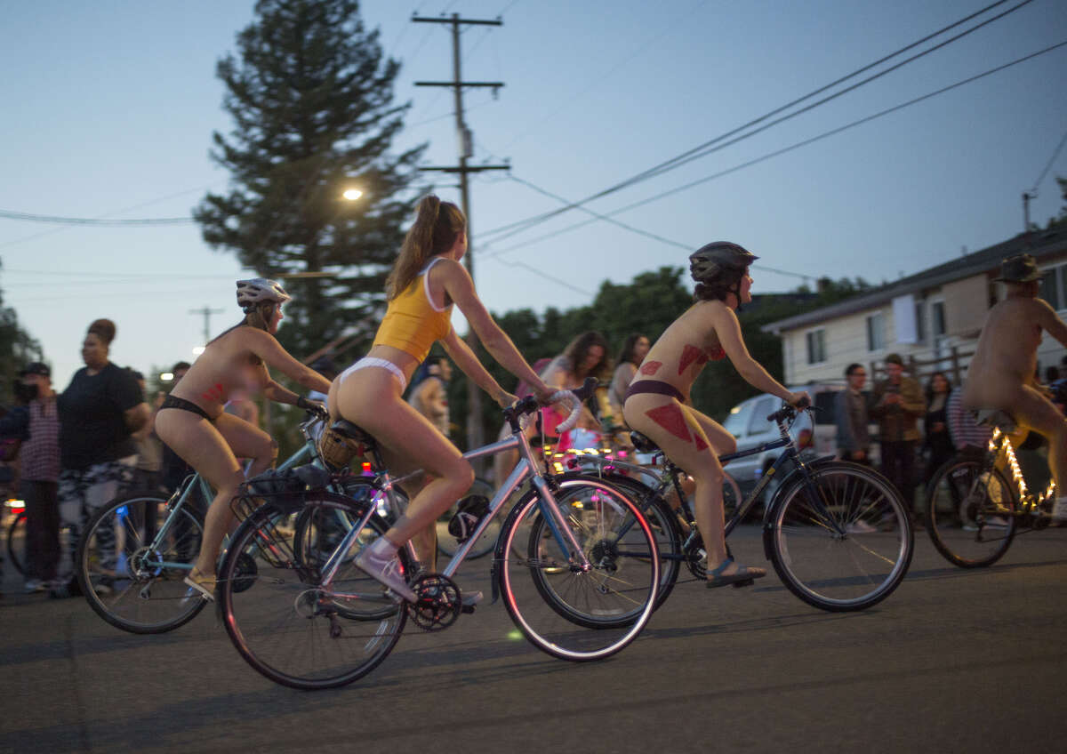 PORTLAND, OR - JUNE 23: (EDITORS NOTE: Image contains nudity.) Cyclists take part in the annual "World Naked Bike Ride" on June 23, 2018 in Portland, Oregon. Thousands of people took part in the event meant to highlight positive body image and to encourage cycling as an oil-free means to transportation. (Photo by Natalie Behring/Getty Images)