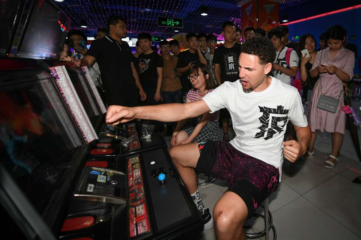 Klay Thompson plays arcade games with fans on June 26, 2018 in Zhengzhou, China. 