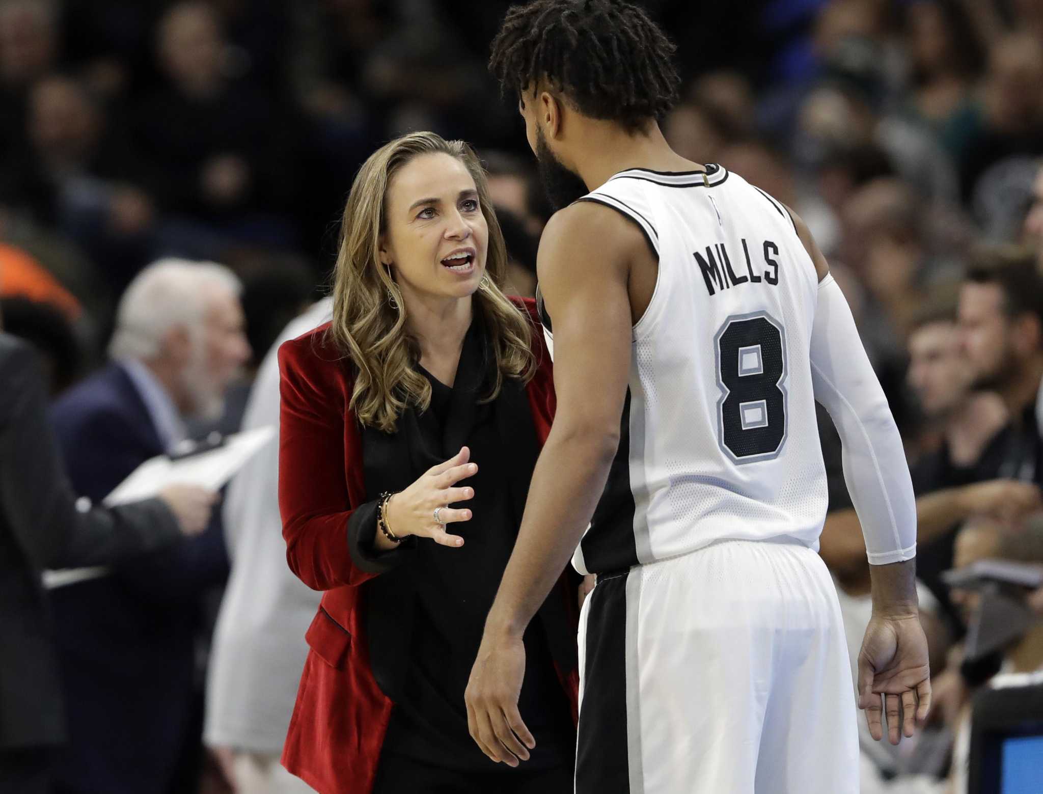 Popovich on Hammon: 'She's a special, special woman.'