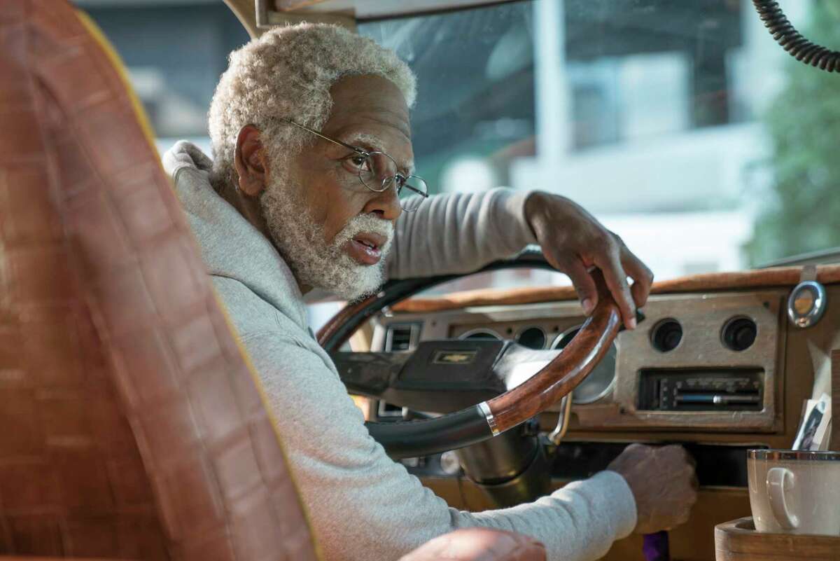 This image released by Lionsgate shows Boston Celtics basketball player Kyrie Irving in a scene from the comedy "Uncle Drew." (Quantrell D. Colbert/Lionsgate via AP)