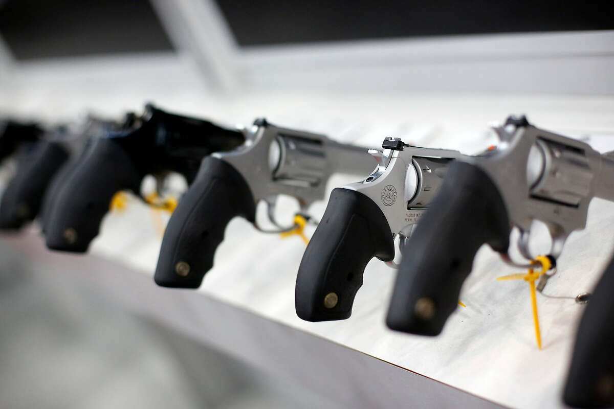 A row of revolvers is seen, during day 1 of the 142nd NRA annual meetings and exhibits, Friday, May 3, 2013 at the George R Brown convention center in (TODD SPOTH FOR THE CHRONICLE)