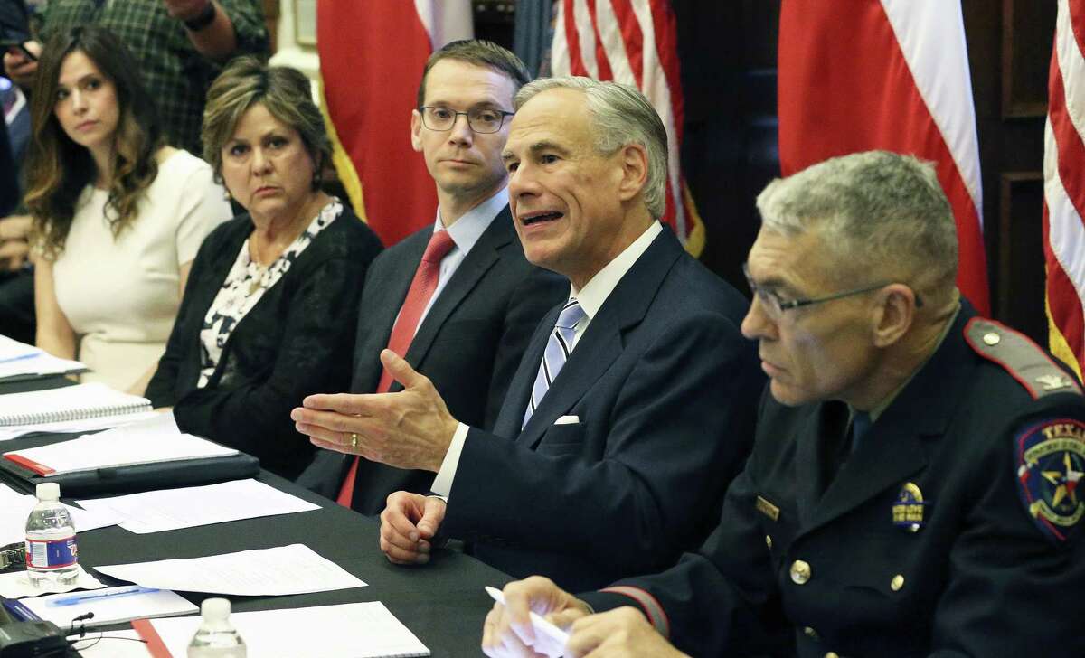 Gov. Greg Abbott leads a roundtable discussionon guns in the wake of the Santa Fe shootings on May 22. He has called for arming more teachers and school staff members.