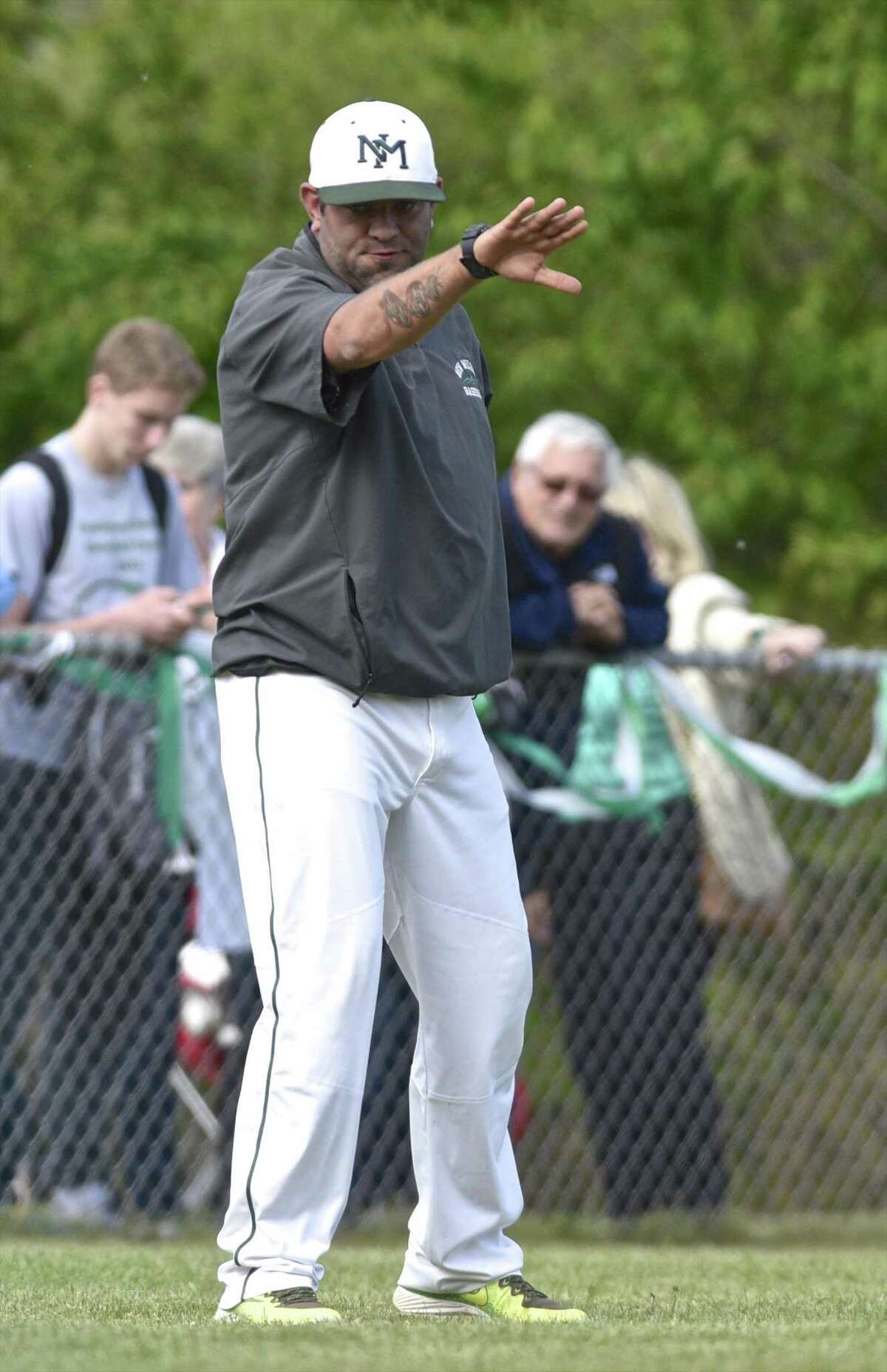 New Milford head coach Ryan Johnson during the boys baseball game between Weston and New Milford high schools. Wednesday afternoon, May 10, 2017, at New Milford High School, in New Milford, Conn.