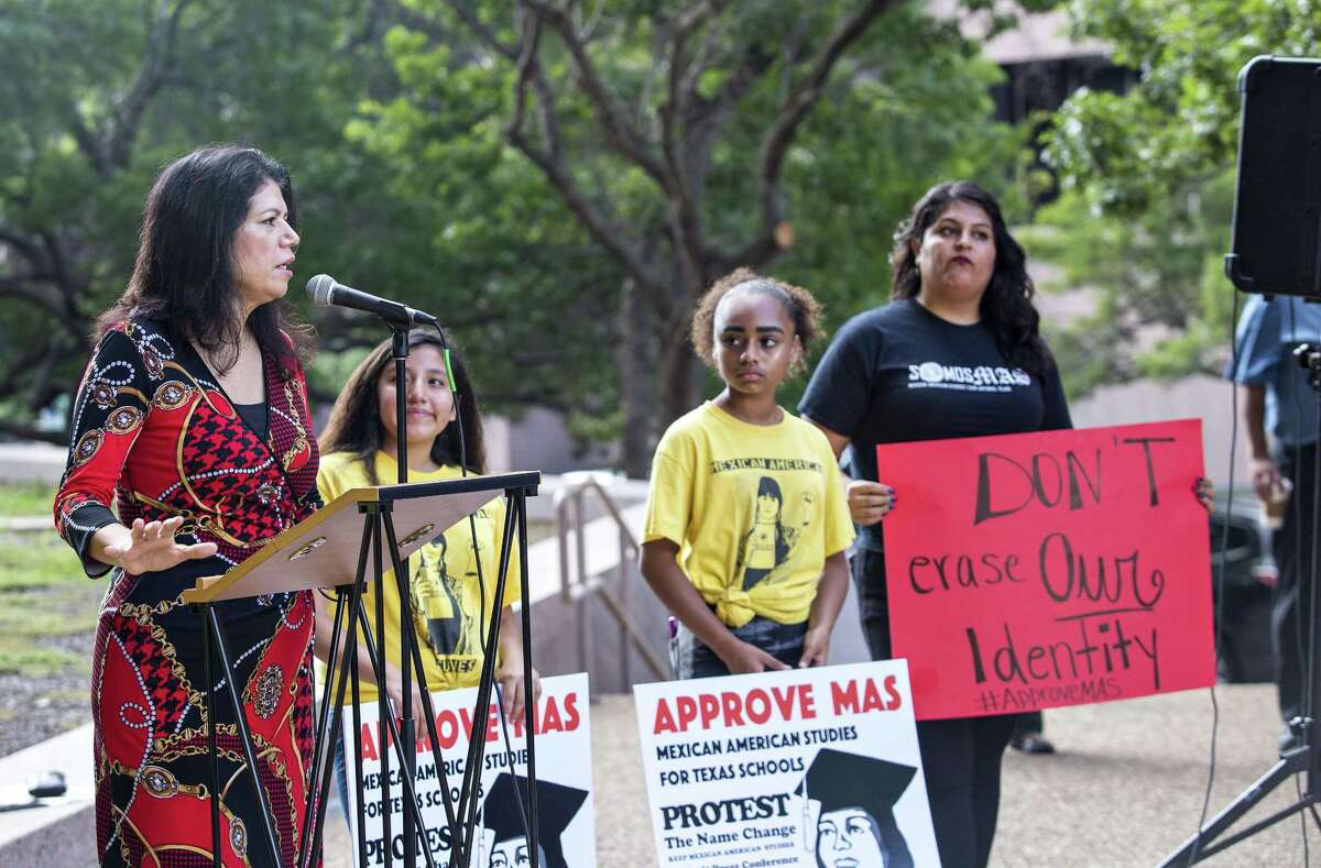 State Rep. Carol Alvarado, D-Houston, speaks to protestors and media who had gathered during a Protest the Name Change/Keep Mexican American Studies Rally and press conference on June 12, 2018 in Austin.
