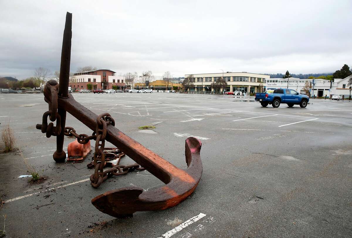 A rusty anchor lies in the back of a parking lot slated for development across from Spenger's restaurant on Fourth Street in Berkeley, Calif. on Thursday, March 8, 2018. Opponents of the project say the site is a sacred Ohlone Indian shellmound burial site.