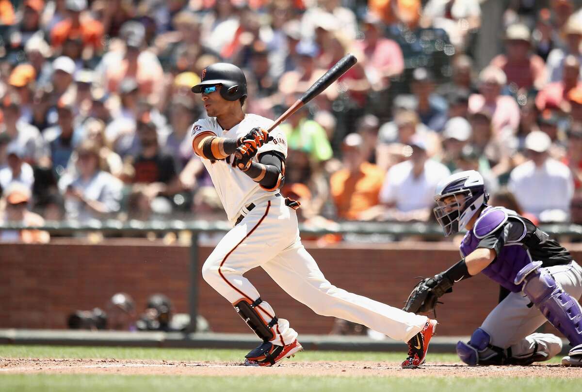 SAN FRANCISCO, CA - JUNE 28: Gorkys Hernandez #7 of the San Francisco Giants hits a single that scored a run against the Colorado Rockies in the fourth inning at AT&T Park on June 28, 2018 in San Francisco, California. (Photo by Ezra Shaw/Getty Images)
