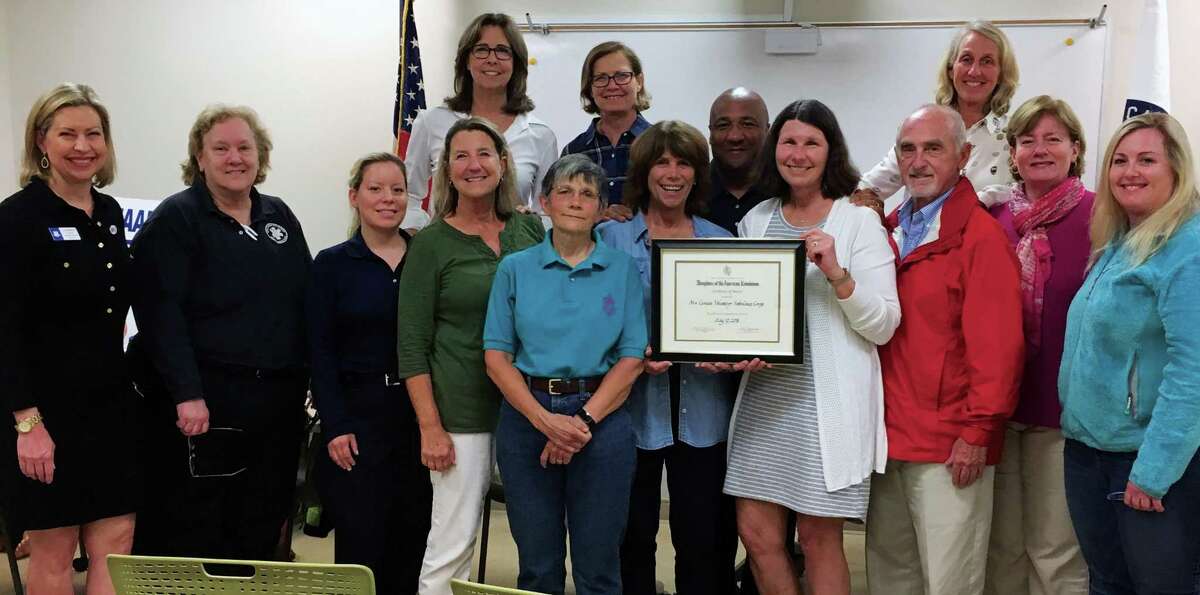 The New Canaan Chapter of the Daughters of the American Revolution presented their 2018 Community Service Award to the New Canaan EMS. Back row, from left: Robin Gestal, Stephanie Dalia, Troy Haynie and Barb Clayton. Front row, from left, DAR Regent Lisa Melland, Judy Hopkins, Bonnie Rumilly, Wendy Hilboldt, Kate Nailor, NCEMS Capt. Wendy Fog, NCEMS President Alison Bedula, Charlie Kelly, DAR member Carrie Sindelar and Kelly Daniel.
