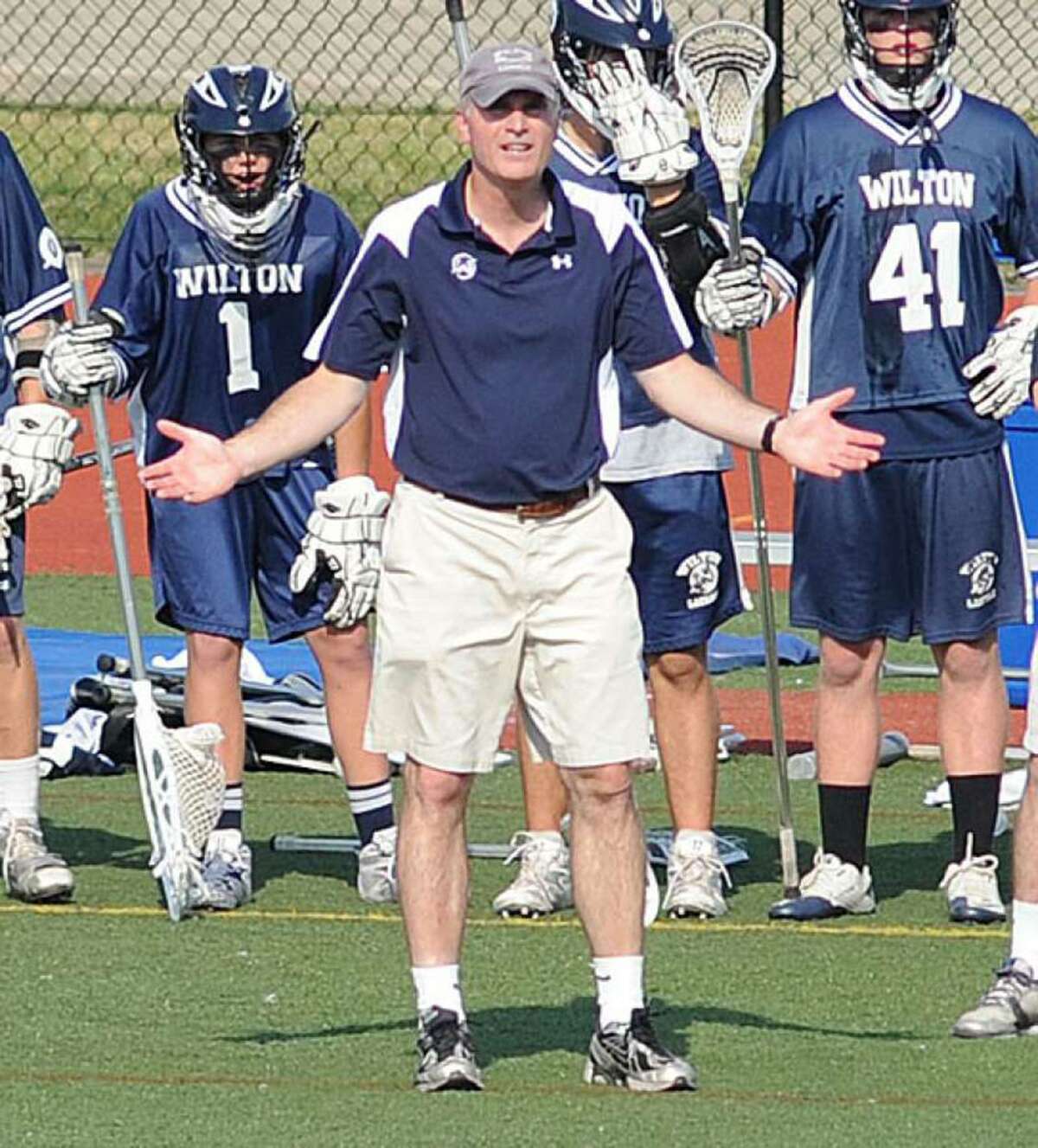 Wilton boys lacrosse coach Steve Pearsall reacts during a game earlier in his coaching career. After 10 years as an assistant with the Warriors, Pearsall was named head coach this week.