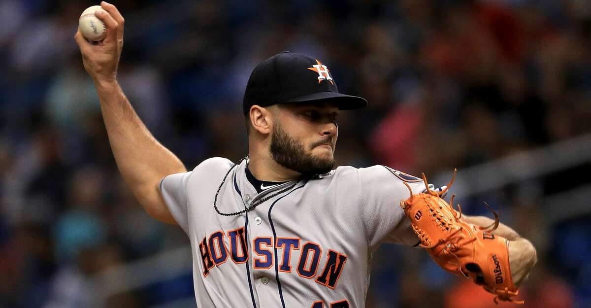 Lance McCullers Jr. #43 of the Houston Astros stands in the dugout