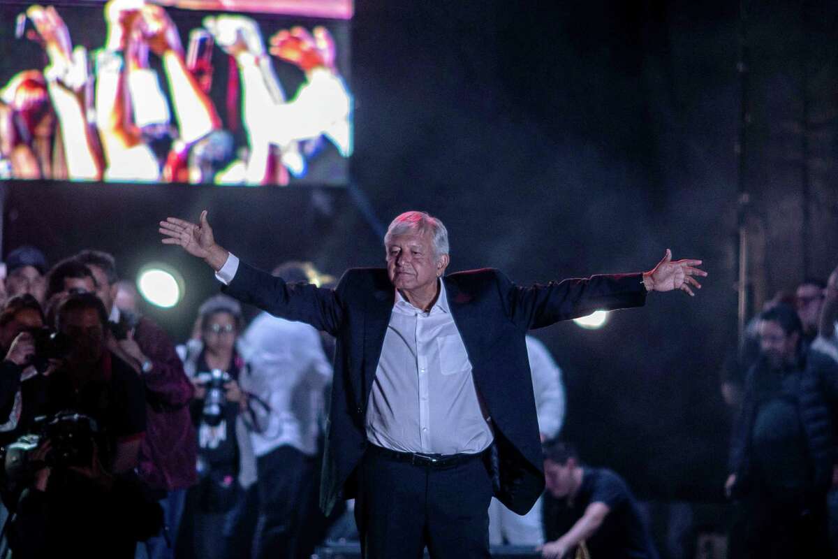 Andres Manuel Lopez Obrador, presidential candidate of the National Regeneration Movement Party, gestures to the crowd during the final campaign rally at the Estadio Azteca in Mexico City, Mexico, on June 27, 2018.