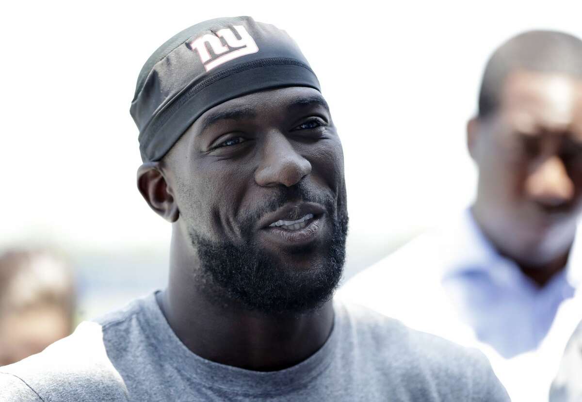 New York Giants safety Michael Thomas talks to reporters during the team's NFL football organized team activities, Tuesday, May 29, 2018, in East Rutherford, N.J. (AP Photo/Julio Cortez)