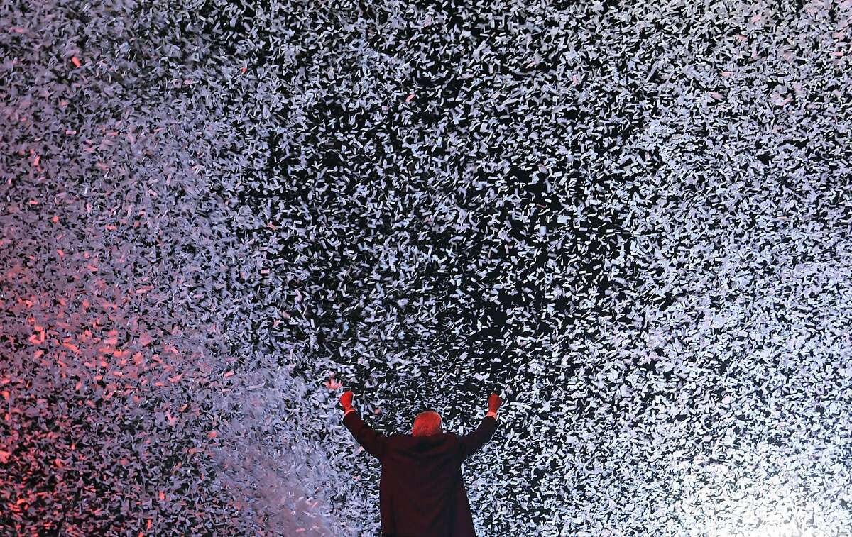 TOPSHOT - Mexico's presidential candidate Andres Manuel Lopez Obrador, standing for the coalition "Juntos haremos historia", waves to supporters during the closing rally of his campaign at the Azteca stadium in Mexico City, on June 27, 2018, ahead of the upcoming July 1 presidential election. / AFP PHOTO / ALFREDO ESTRELLAALFREDO ESTRELLA/AFP/Getty Images