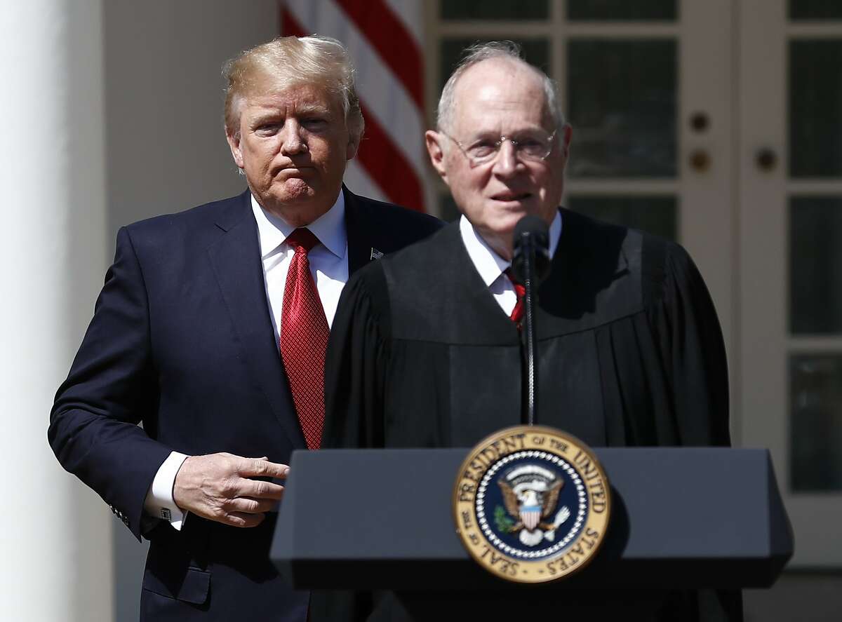 FILE - In this April 10, 2017, file photo, President Donald Trump, left, and Supreme Court Justice Anthony Kennedy participate in a public swearing-in ceremony for Justice Neil Gorsuch in the Rose Garden of the White House White House in Washington. The 81-year-old Kennedy said Tuesday, June 27, 2018, that he is retiring after more than 30 years on the court. (AP Photo/Carolyn Kaster, File)